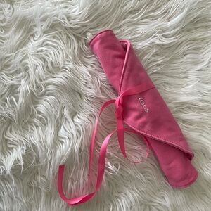 Super cute Tous faux suade jewelry travel bag.
Approximately 11” like new